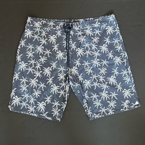 Travis Mathew Blue and White Palm Tree Board Shorts